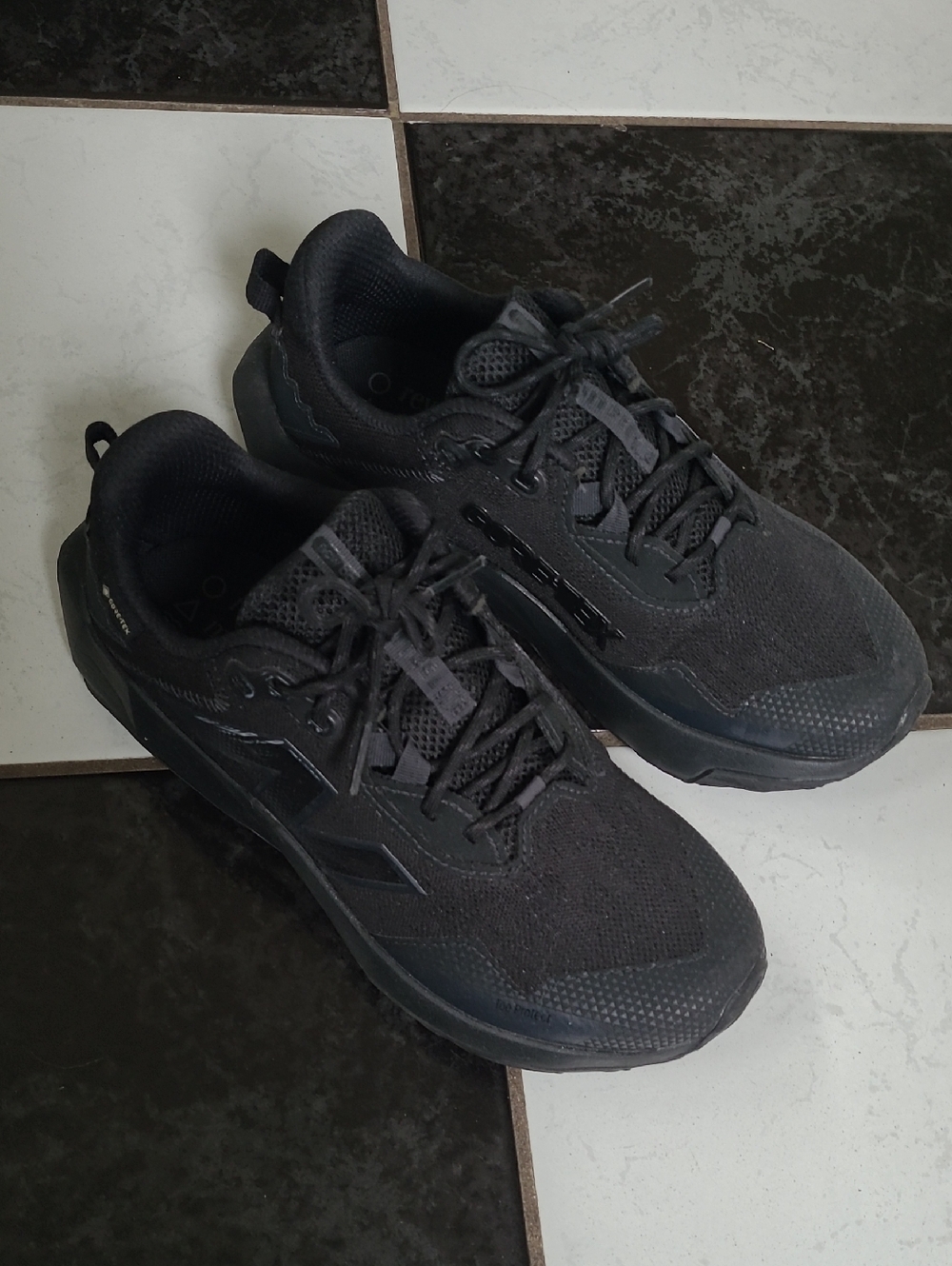 New Balance - Men's Black Athletic Sneakers